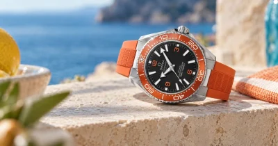 Five colorful Omega watches perfect for summer style, featuring vibrant dials, sporty designs, and luxury Swiss watchmaking.